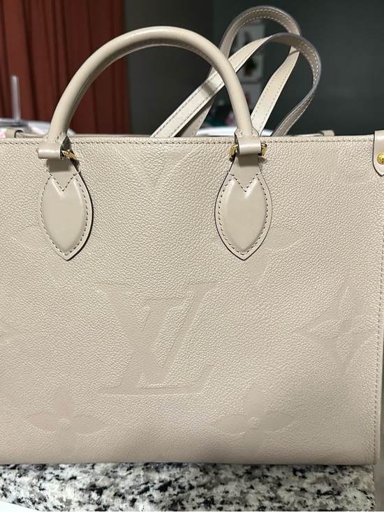 Louis Vuitton Handbags - Louis Vuitton Onthego MM.  LV Light Beige Embossed Leather Tote